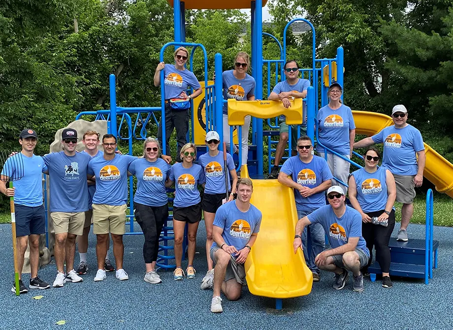 The Deerfieeld team participating in a community playground clean up.